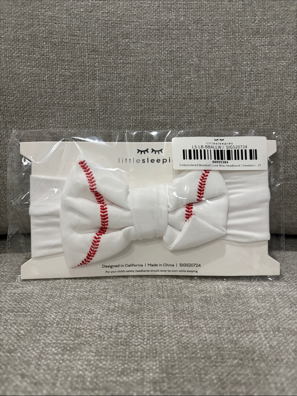 Little Sleepies White Headband with Red Baseball Stitching Bow